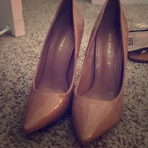 Nude patent heels